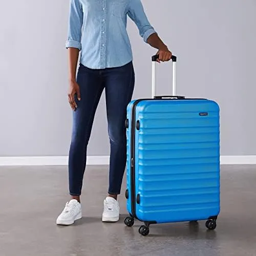 Amazon Basics Suitcase, Hardside Luggage with Spinner Wheels, Scratch-Resistant Surface, Light Blue, 30-Inch