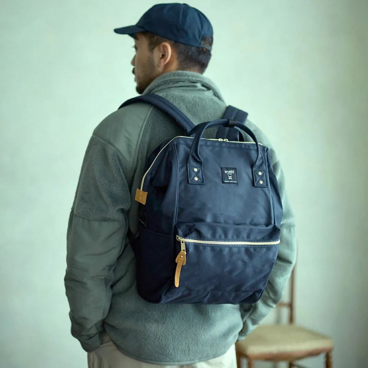 Anello Cross Bottle Backpack Regular in Navy